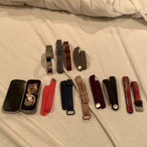 EUC bundle of Fitbit wristbands for older version of Luxe. Some original Fitbit